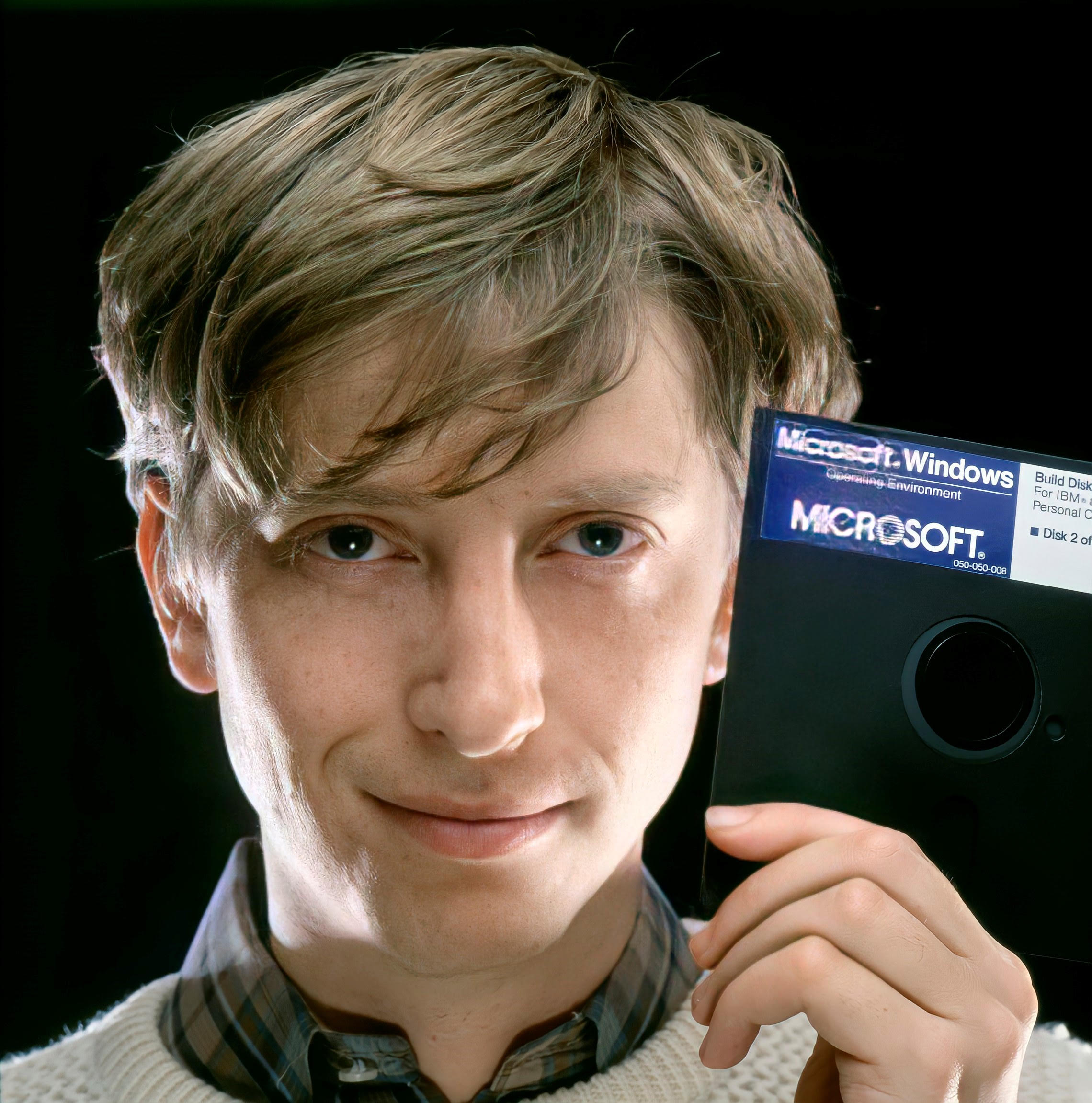 Bill Gates holding a Microsoft disk