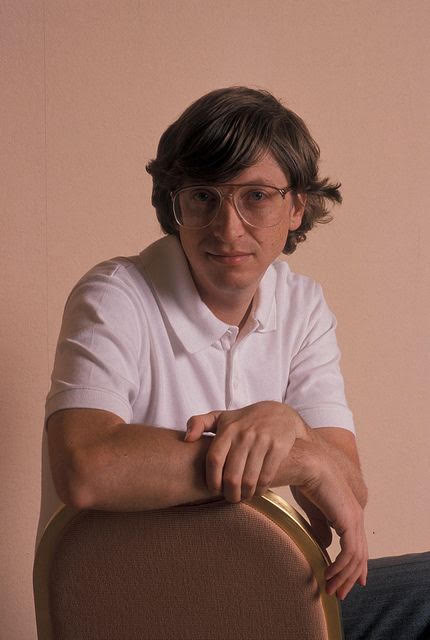 Portrait of Bill Gates seated in a chair