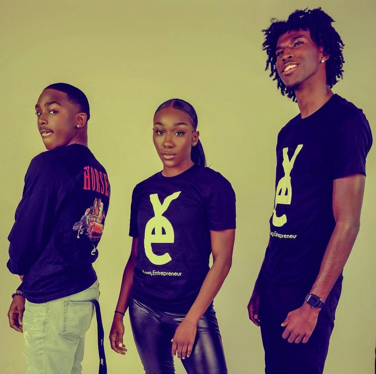 Three young founders wearing Young Entrepreneur shirts